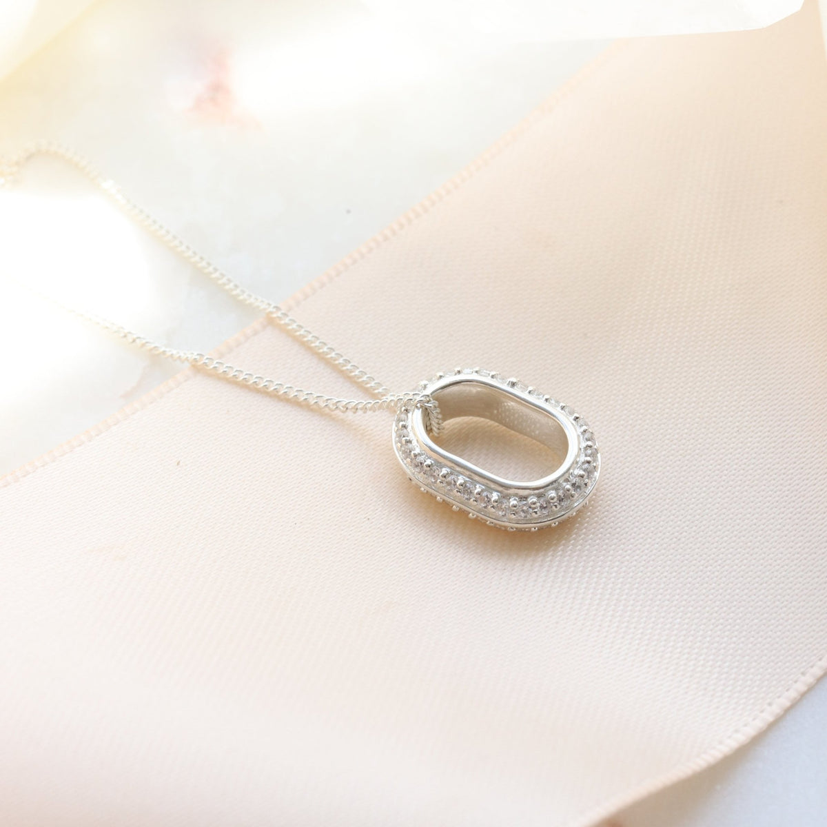 LOVE ETERNITY OVAL PENDANT NECKLACE - CUBIC ZIRCONIA &amp; SILVER - SO PRETTY CARA COTTER