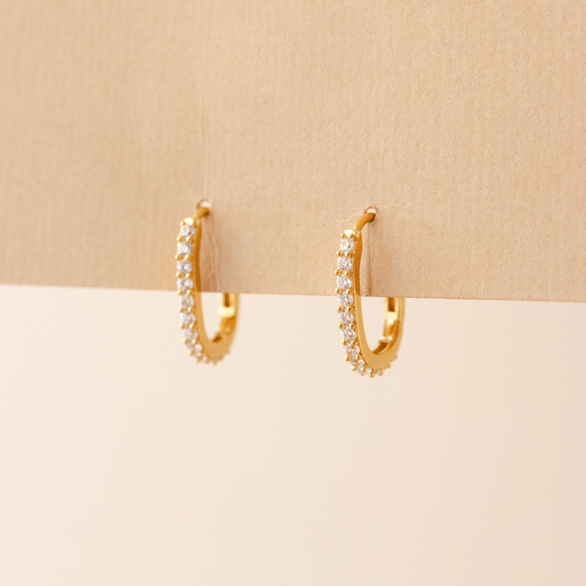 LOVE OVAL HUGGIE HOOPS- GOLD - SO PRETTY CARA COTTER