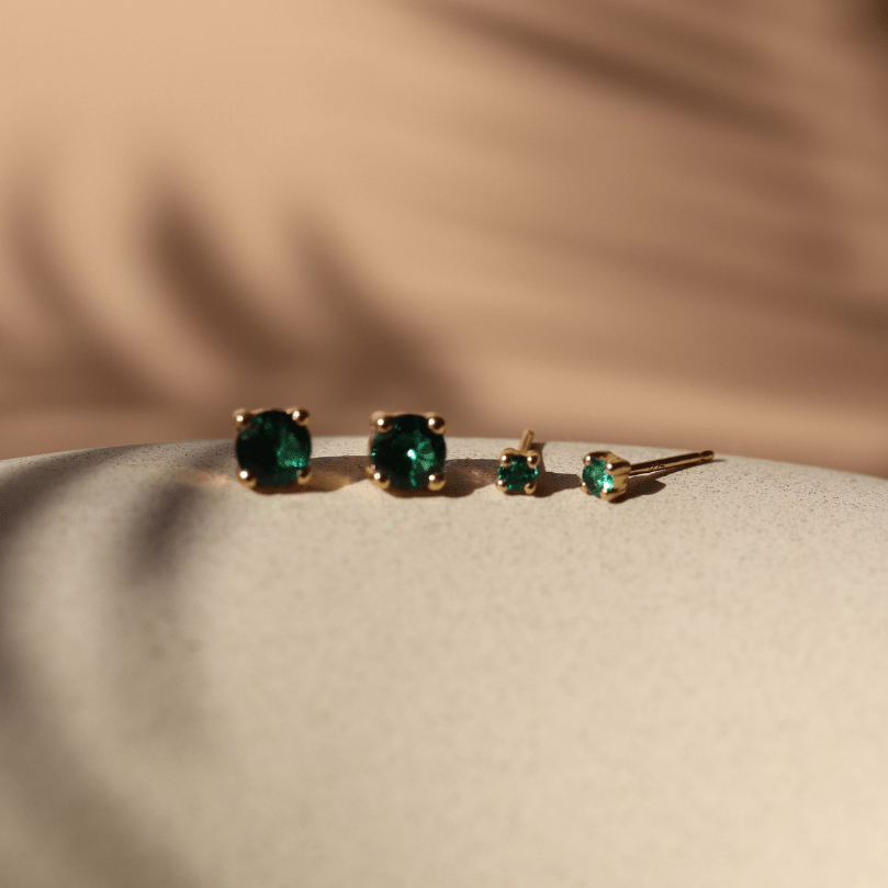 MINI LOVE SOLITAIRE STUDS - EMERALD - SO PRETTY CARA COTTER