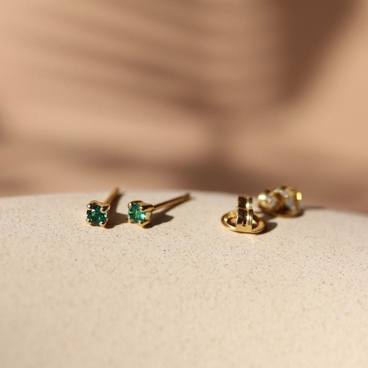 MINI LOVE SOLITAIRE STUDS - EMERALD - SO PRETTY CARA COTTER