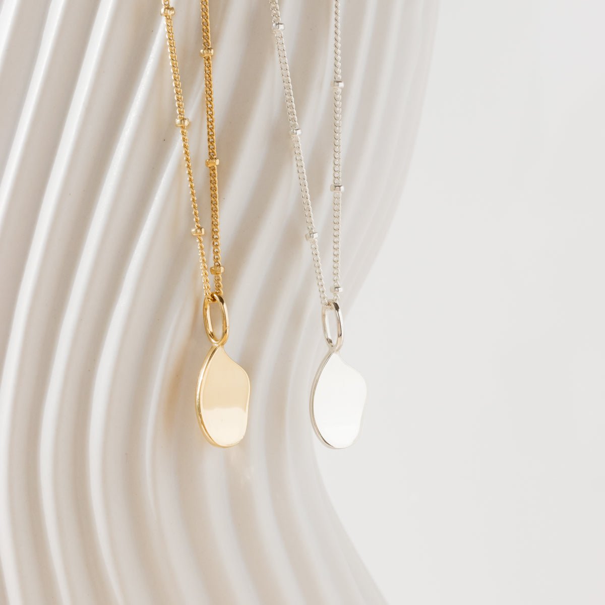 POISE CURVE PENDANT NECKLACE - SO PRETTY CARA COTTER