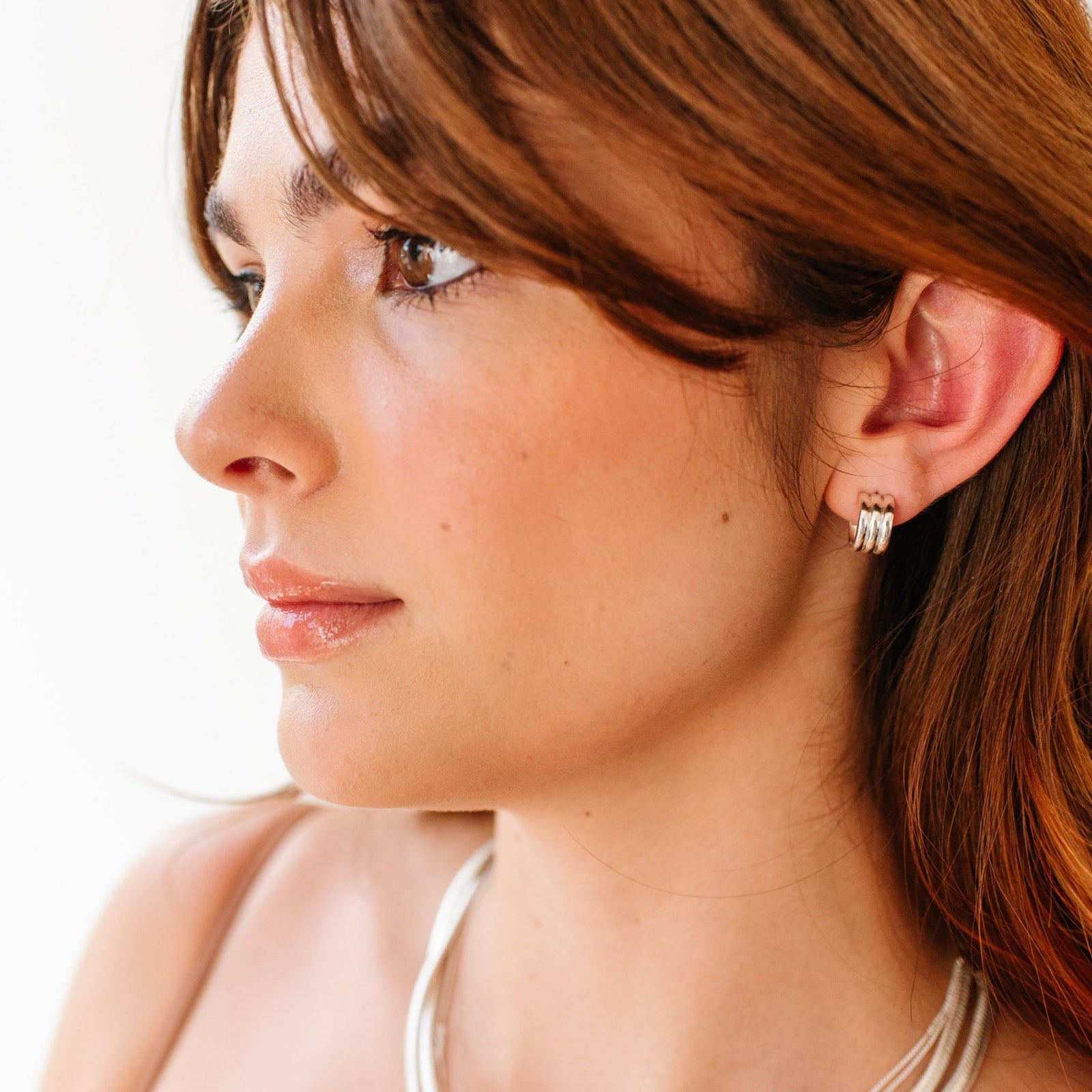 FEARLESS ARC HUGGIE HOOPS - SILVER - SO PRETTY CARA COTTER