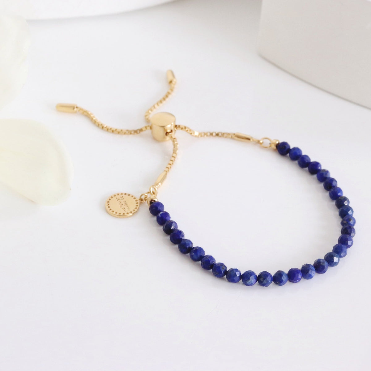 ICONIC ADJUSTABLE BRACELET - LAPIS &amp; GOLD - SO PRETTY CARA COTTER