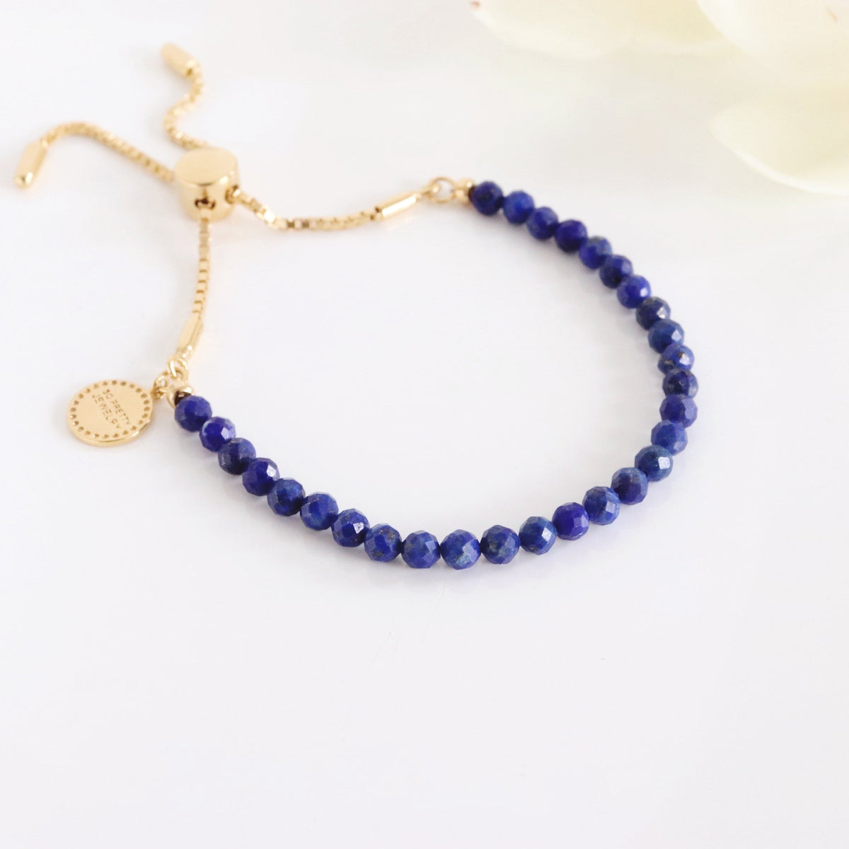 ICONIC ADJUSTABLE BRACELET - LAPIS &amp; GOLD - SO PRETTY CARA COTTER