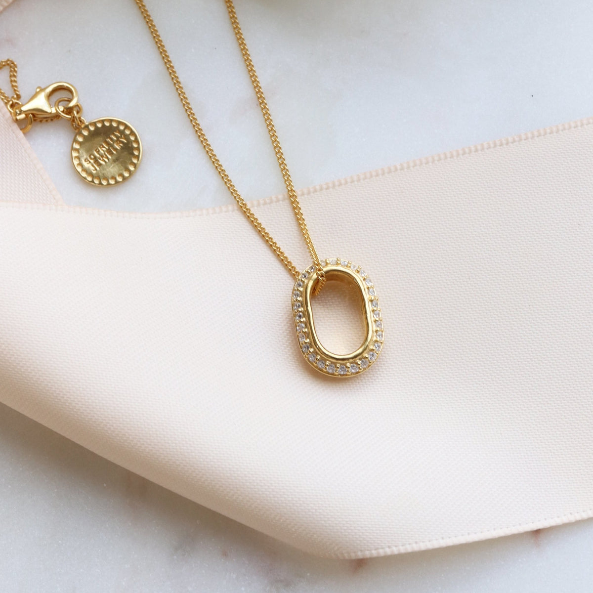 LOVE ETERNITY OVAL PENDANT NECKLACE - CUBIC ZIRCONIA &amp; GOLD - SO PRETTY CARA COTTER