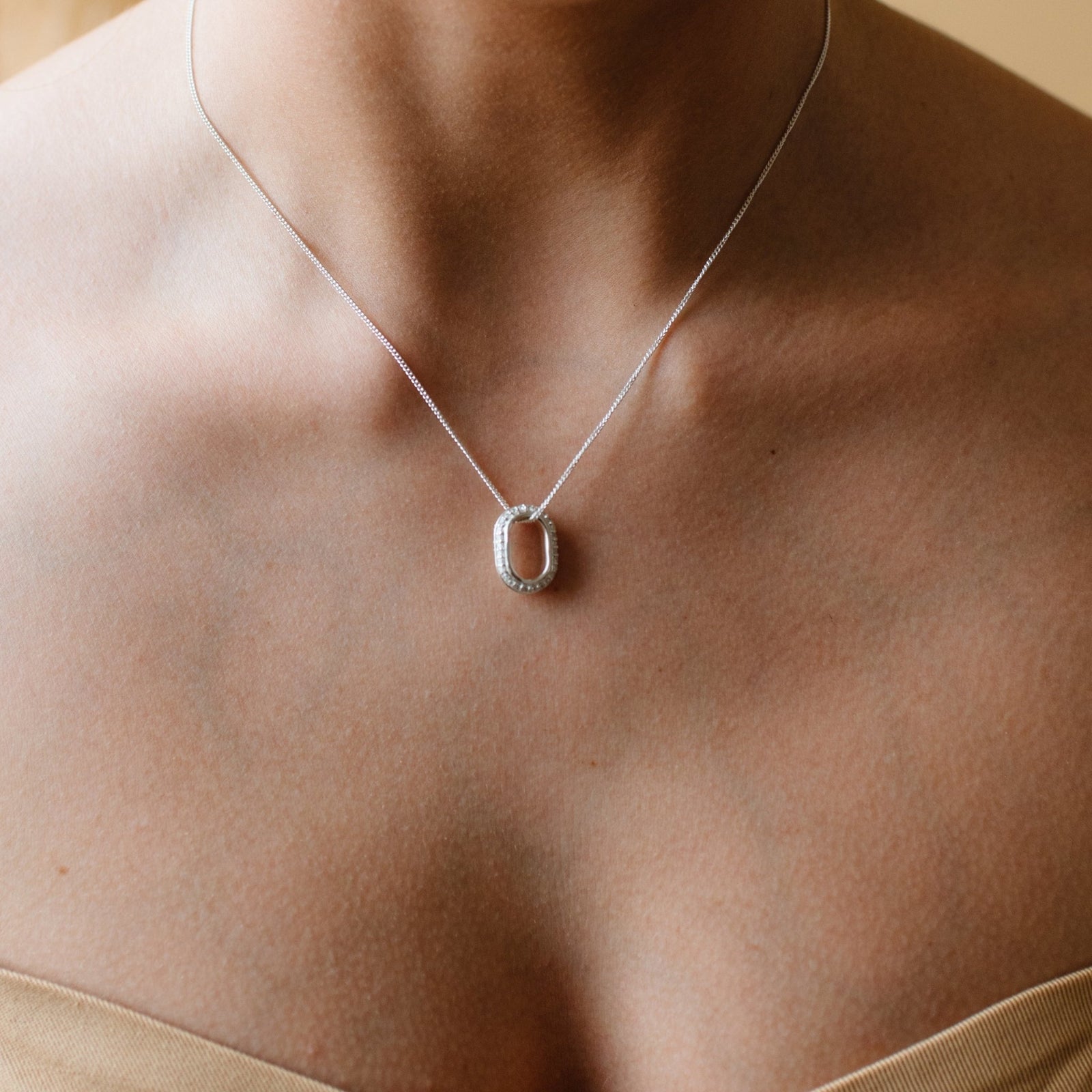 LOVE ETERNITY OVAL PENDANT NECKLACE - CUBIC ZIRCONIA & SILVER - SO PRETTY CARA COTTER