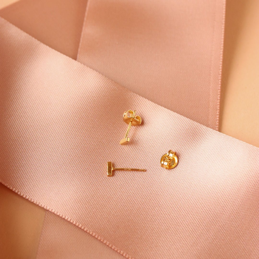 TINY POISE BAR STUDS - GOLD - SO PRETTY CARA COTTER