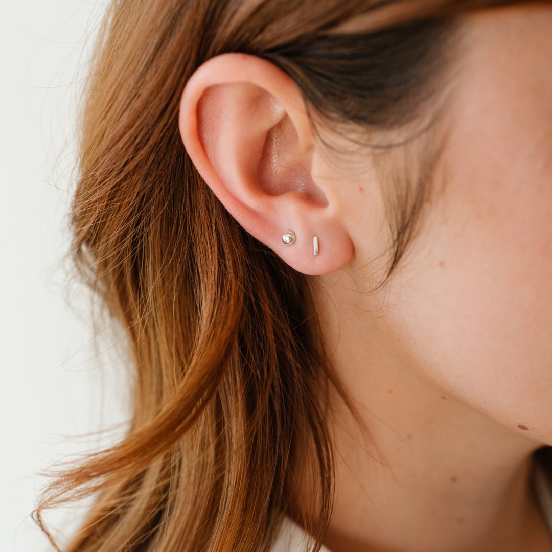 TINY POISE BAR STUDS - SILVER - SO PRETTY CARA COTTER