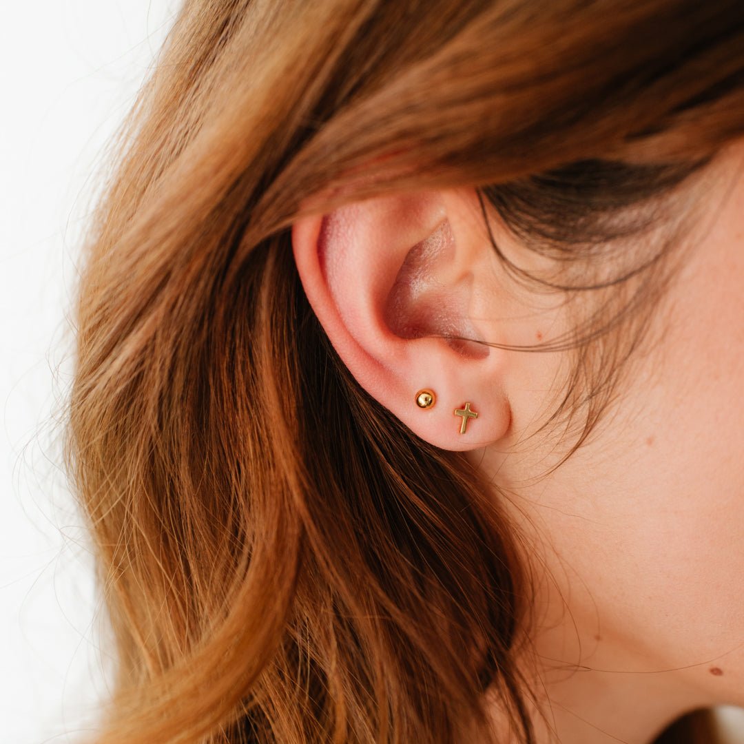 TINY POISE CROSS STUDS - GOLD - SO PRETTY CARA COTTER