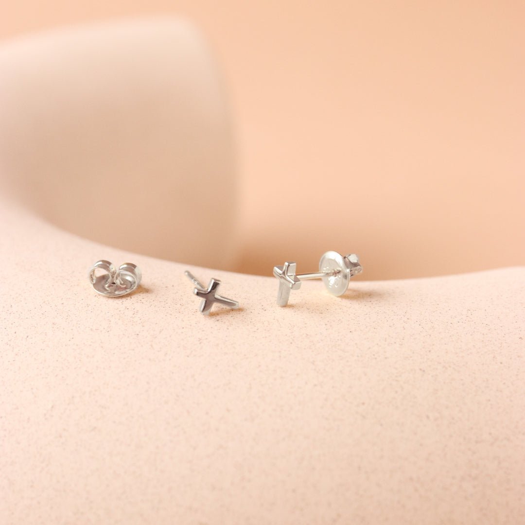 TINY POISE CROSS STUDS - SILVER - SO PRETTY CARA COTTER