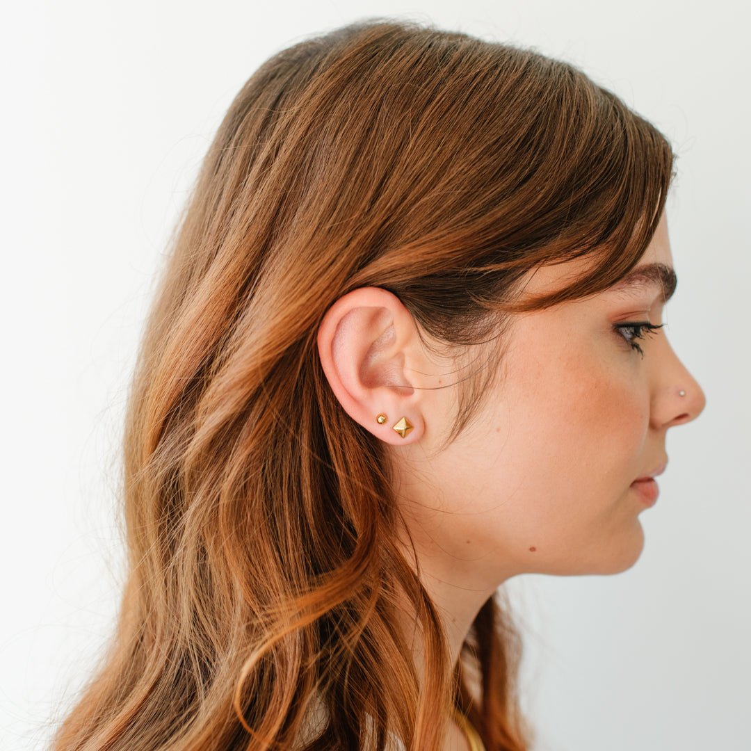 TINY POISE PYRAMID STUDS - GOLD - SO PRETTY CARA COTTER
